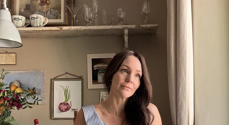 April in a softly lit cottage interior